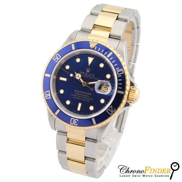 side view of steel and gold rolex sub